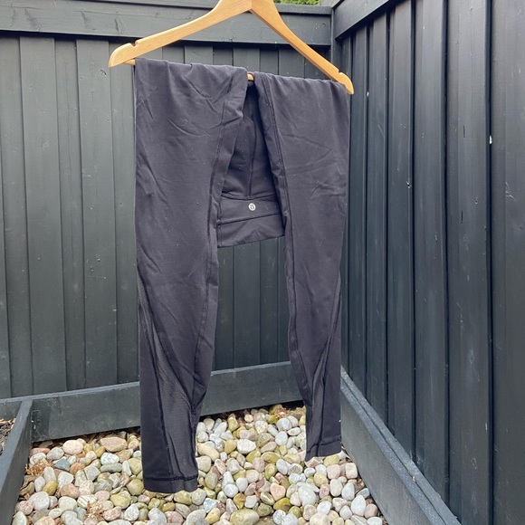 Black lululemon leggings, with mesh cut outs on bottom - Picture 2 of 5